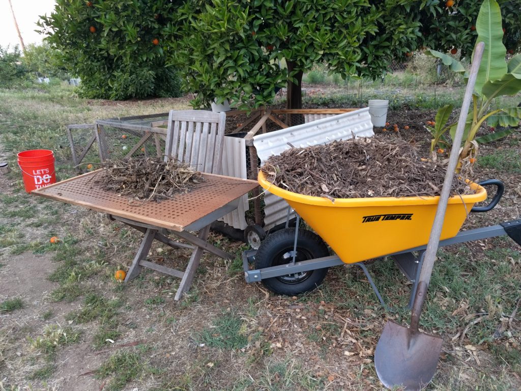 Screening chicken compost